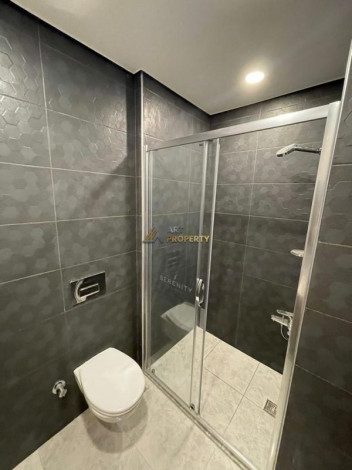 Двухкомнатная квартира в комплексе с инфраструктурой уровня 5-ти звездочного отеля в Махмутлар, 50м2 - Ракурс 9