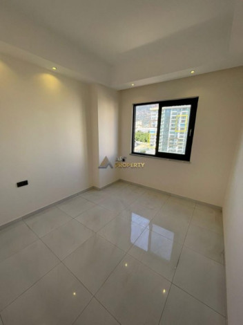 Двухкомнатная квартира в комплексе с инфраструктурой уровня 5-ти звездочного отеля в Махмутлар, 50м2 - Ракурс 13