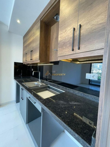 Двухкомнатная квартира в комплексе с инфраструктурой уровня 5-ти звездочного отеля в Махмутлар, 50м2 - Ракурс 17