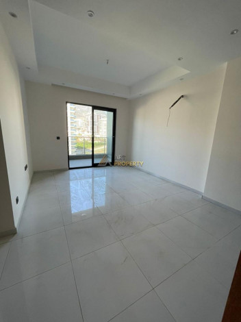 Двухкомнатная квартира в комплексе с инфраструктурой уровня 5-ти звездочного отеля в Махмутлар, 50м2 - Ракурс 19