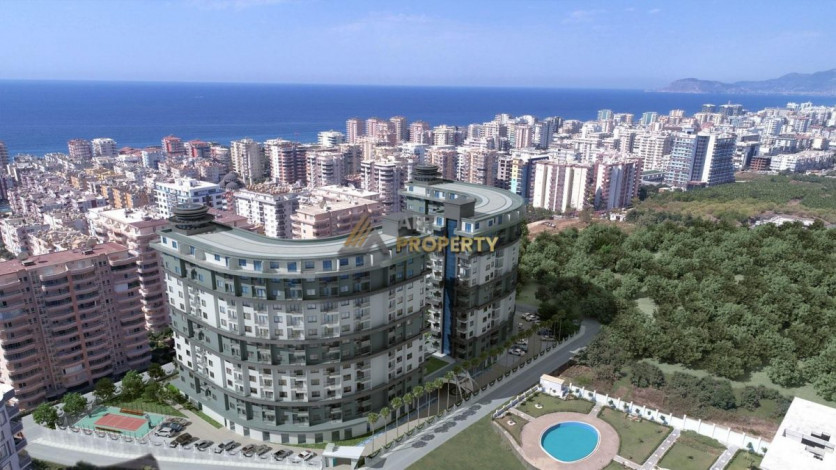 Двухкомнатная квартира в комплексе с инфраструктурой уровня 5-ти звездочного отеля в Махмутлар, 50м2 - Ракурс 22