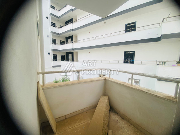 Апартаменты в 200 метрах от моря планировки 2+1 в районе Махмутлар, 120м2 - Ракурс 15