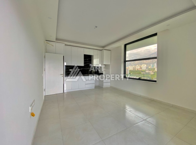 Квартира с потрясающим видом на горы планировки 2+1 в районе Махмутлар, 80м2 - Ракурс 2