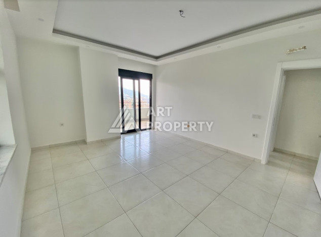 Квартира с потрясающим видом на горы планировки 2+1 в районе Махмутлар, 80м2 - Ракурс 3