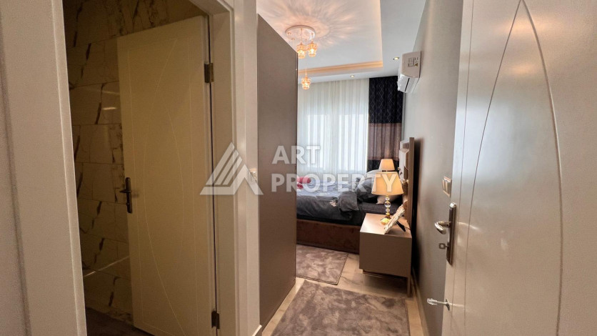 Квартира со стильным дизайном планировки 2+1 в районе Махмутлар, 135м2 - Ракурс 16