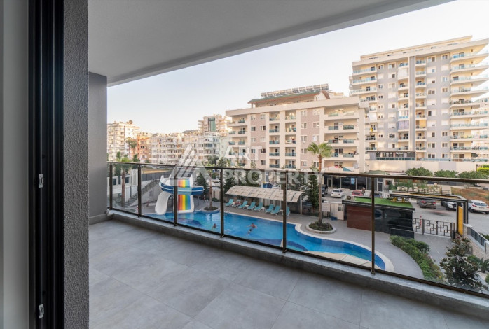 Апартаменты в потрясающем жилом комплексе в районе Махмутлар 2+1, 95м2 - Ракурс 18