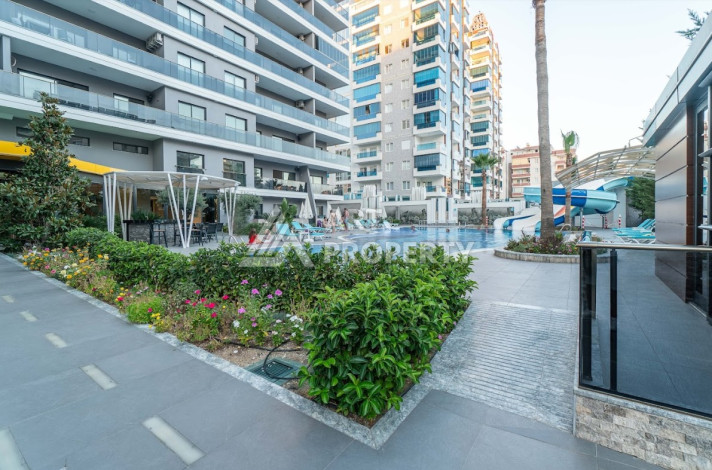 Апартаменты в потрясающем жилом комплексе в районе Махмутлар 2+1, 95м2 - Ракурс 32