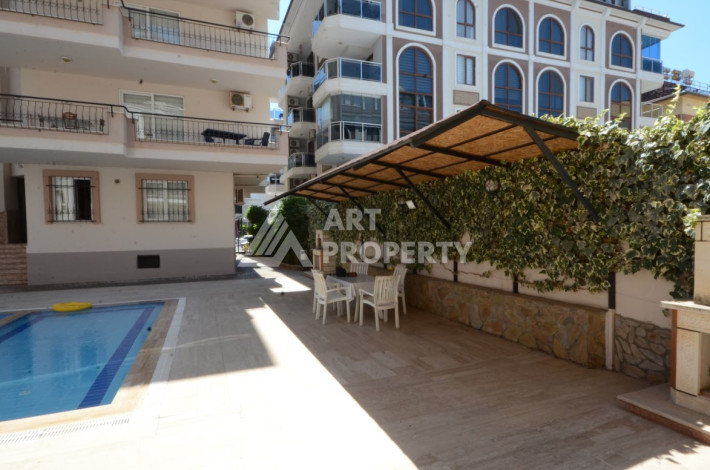 Апартаменты всего в 200 метрах от моря в районе Оба. Планировка 2+1, 100м2 - Ракурс 2