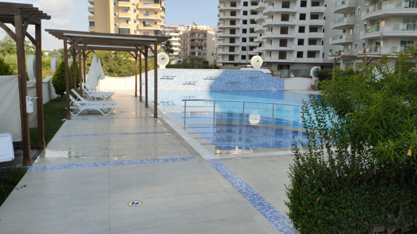 Двухкомнатная квартира с красивым видом на море в районе Махмутлар, 75 м2 - Ракурс 6