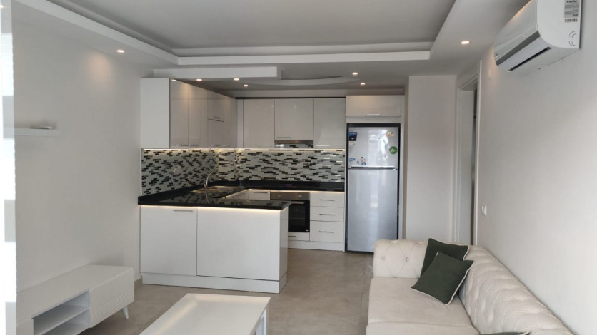 Двухкомнатная квартира с красивым видом на море в районе Махмутлар, 75 м2 - Ракурс 9