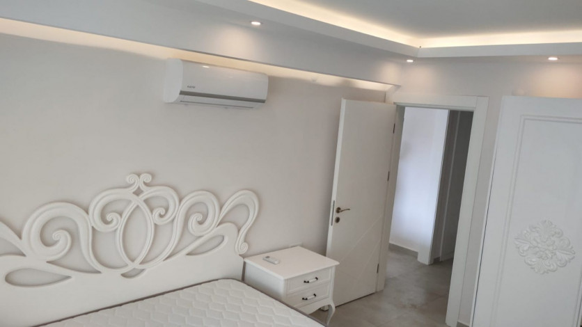 Двухкомнатная квартира с красивым видом на море в районе Махмутлар, 75 м2 - Ракурс 13