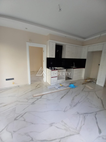 Апартаменты в новом жилом комплексе планировки 1+1 в центре Алании, 55м2 - Ракурс 7