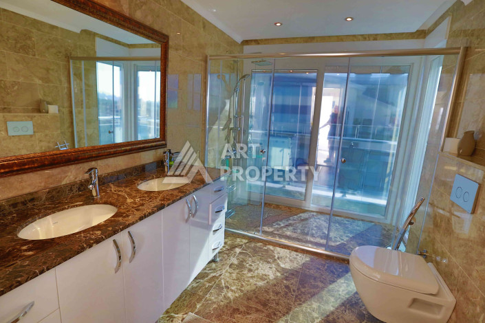 Дуплекс с потрясающей террасой и видом на море планировки 3+2 в районе Джикджилли, 250м2 - Ракурс 24