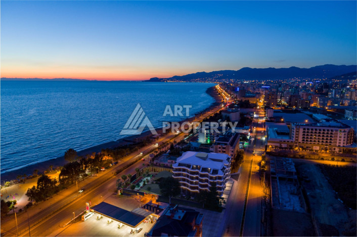 Квартира 2+1 на первой линии моря в комплексе премиум класса на завершающем этапе строительства! - Ракурс 12