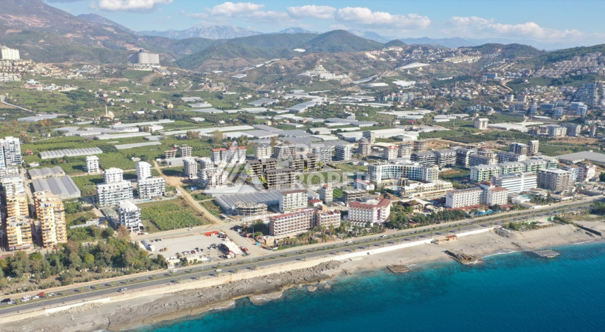 Новый инвестиционный проект в 200 метрах от моря в районе Каргыджак! - Ракурс 11