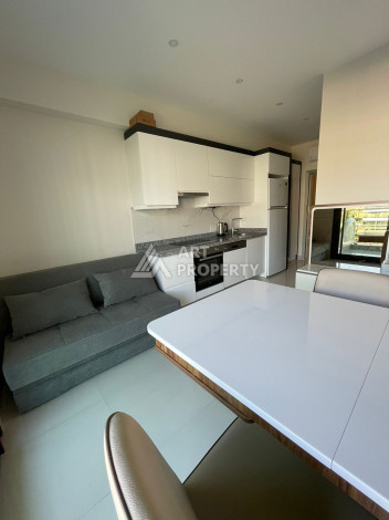 Апартаменты в 50 метрах от моря в шикарном жилом комплексе в районе Каргыджак. Планировка 1+1, 50м2 - Ракурс 4