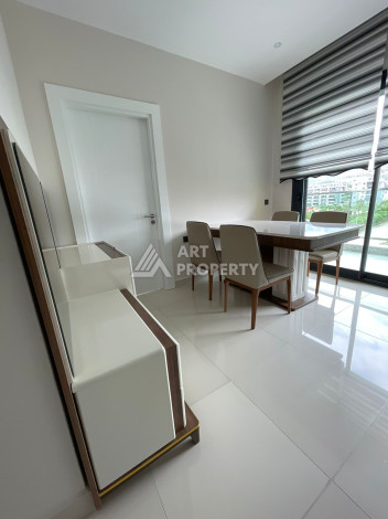 Апартаменты в 50 метрах от моря в шикарном жилом комплексе в районе Каргыджак. Планировка 1+1, 50м2 - Ракурс 6