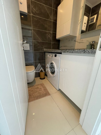 Апартаменты в 50 метрах от моря в шикарном жилом комплексе в районе Каргыджак. Планировка 1+1, 50м2 - Ракурс 11