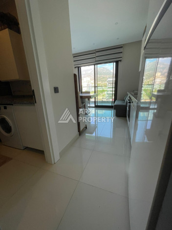 Апартаменты в 50 метрах от моря в шикарном жилом комплексе в районе Каргыджак. Планировка 1+1, 50м2 - Ракурс 12