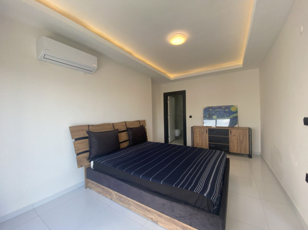 Меблированные двухуровневые апартаменты 3+1 в центре Махмутлара, 157 м2 - Ракурс 24