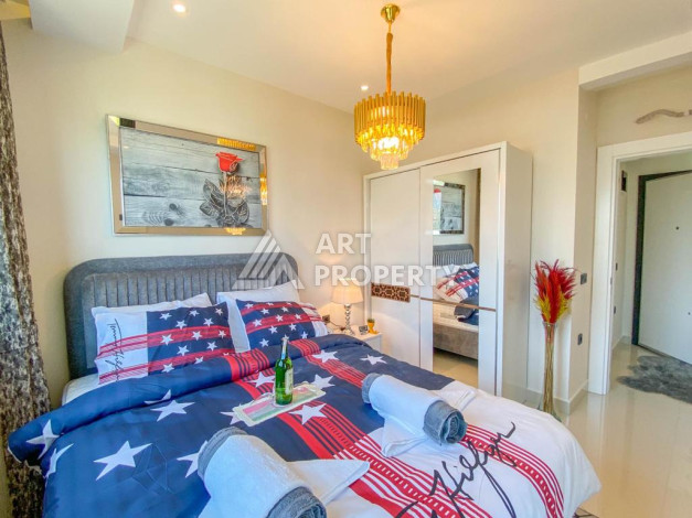 Стильные апартаменты в современном жилом комплексе планировки 1+1, 50м2 - Ракурс 9