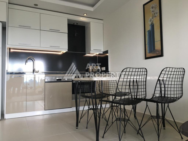 Квартира с новой мебелью планировки 1+1 в районе Махмутлар, 62м2 - Ракурс 2