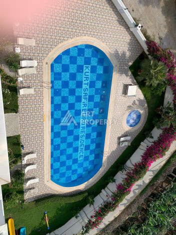 Квартира с новой мебелью планировки 1+1 в районе Махмутлар, 62м2 - Ракурс 21