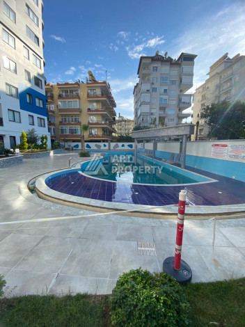 Апартаменты в центре Алании в комплексе с развитой инфраструктурой. Планировка 1+1, 50м2 - Ракурс 2