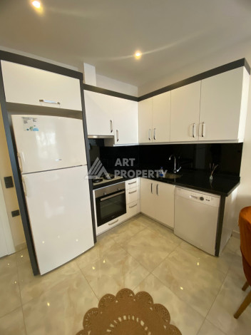 Апартаменты в центре Алании в комплексе с развитой инфраструктурой. Планировка 1+1, 50м2 - Ракурс 5