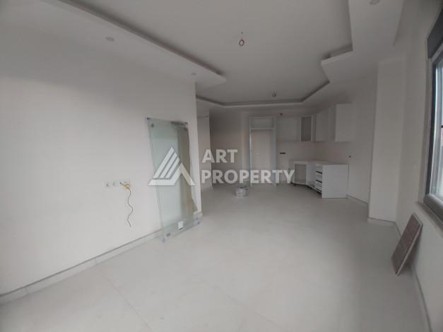 Квартира в абсолютно новом жилом комплексе планировки 1+1 в районе Махмутлар, 50м2 - Ракурс 2