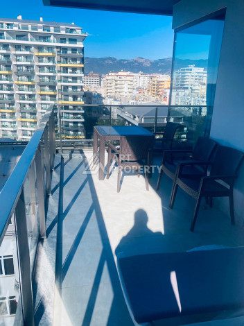 Меблированная квартира с видом на море планировки 2+1 в районе Махмутлар, 135м2 - Ракурс 15