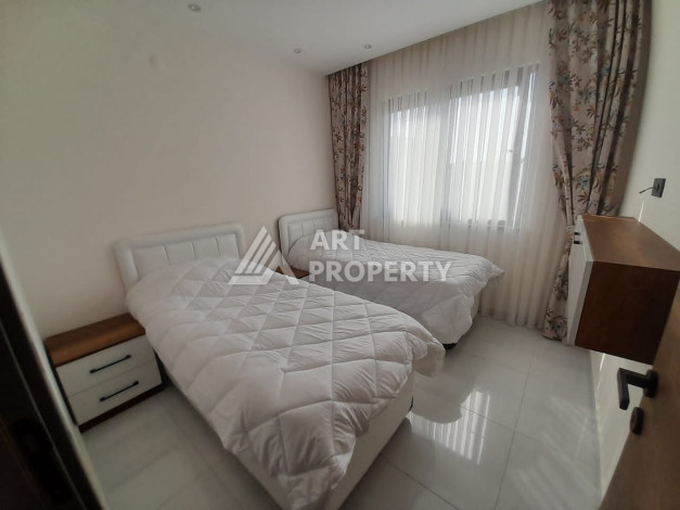 Апартаменты в жилом комплексе с инфраструктурой отеля 5* в районе Махмутлар, 90м2 - Ракурс 9