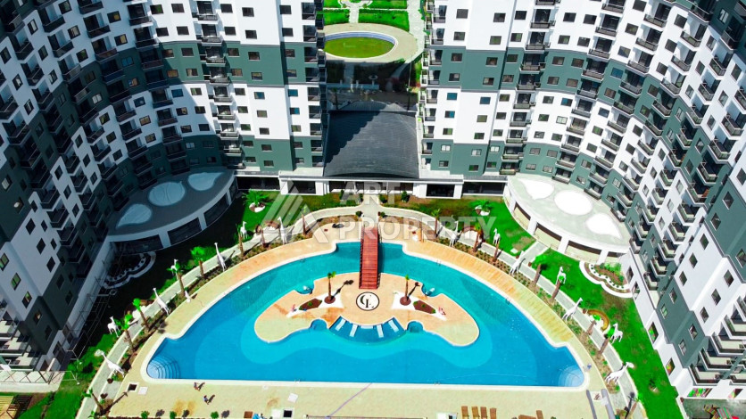 Апартаменты в жилом комплексе с инфраструктурой отеля 5* в районе Махмутлар, 90м2 - Ракурс 25