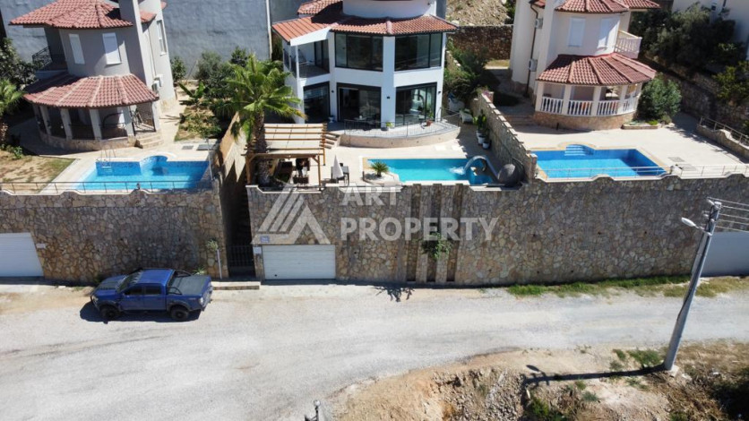 Великолепная вилла с собственным бассейном и панорамным видом в районе Каргыджак. Планировка 4+1, 185м2,  площадь участка 403м2. - Ракурс 35