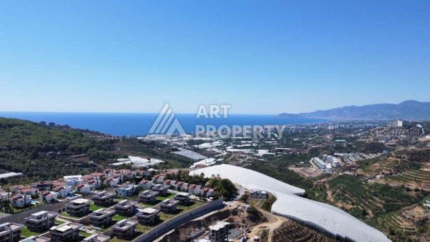 Великолепная вилла с собственным бассейном и панорамным видом в районе Каргыджак. Планировка 4+1, 185м2,  площадь участка 403м2. - Ракурс 36