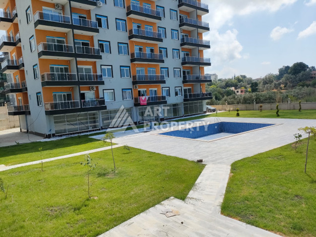 Апартаменты в живописном районе Авсаллар планировки 1+1, 60м2 - Ракурс 17