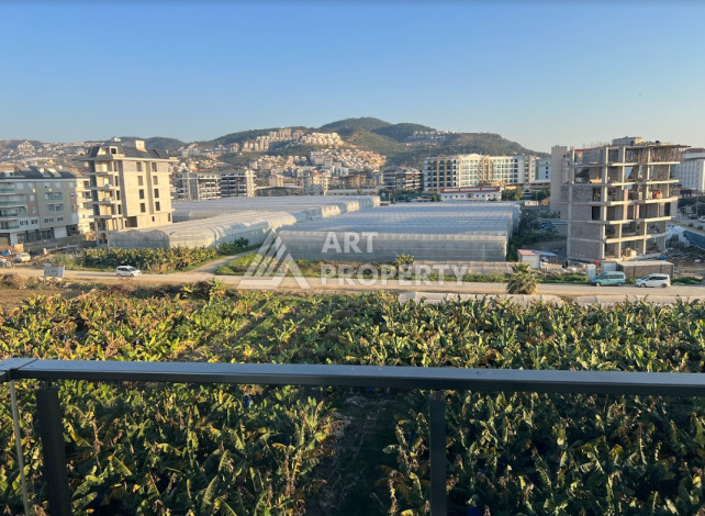 Квартира всего в 100 метрах от моря в экологически чистом районе Каргыджак планировки 1+1, 51м2 - Ракурс 2