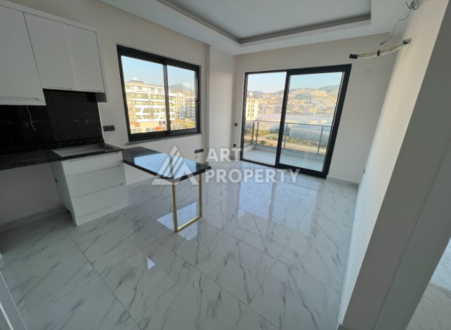 Квартира всего в 100 метрах от моря в экологически чистом районе Каргыджак планировки 1+1, 51м2 - Ракурс 3