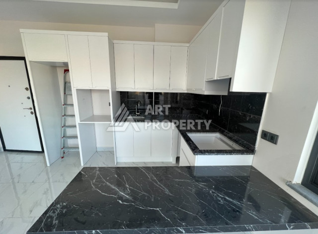 Квартира всего в 100 метрах от моря в экологически чистом районе Каргыджак планировки 1+1, 51м2 - Ракурс 7