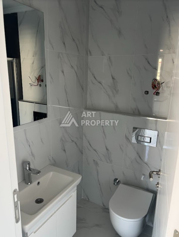 Квартира всего в 100 метрах от моря в экологически чистом районе Каргыджак планировки 1+1, 51м2 - Ракурс 9