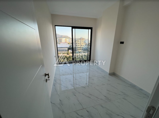 Квартира всего в 100 метрах от моря в экологически чистом районе Каргыджак планировки 1+1, 51м2 - Ракурс 13