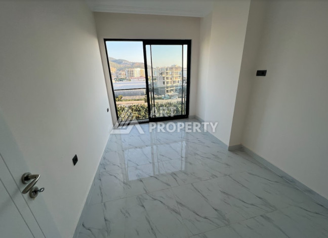 Квартира всего в 100 метрах от моря в экологически чистом районе Каргыджак планировки 1+1, 51м2 - Ракурс 15