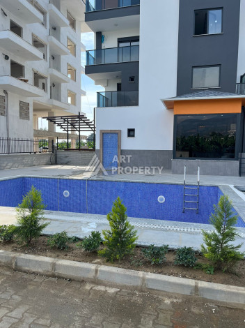 Квартира в 50-ти метрах от моря в районе Каргыджак. Планировка 1+1, 60м2 - Ракурс 5