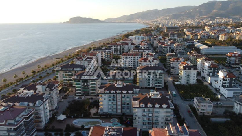 Меблированная квартира вблизи моря планировки 1+1 в районе Кестель, 70м2 - Ракурс 2