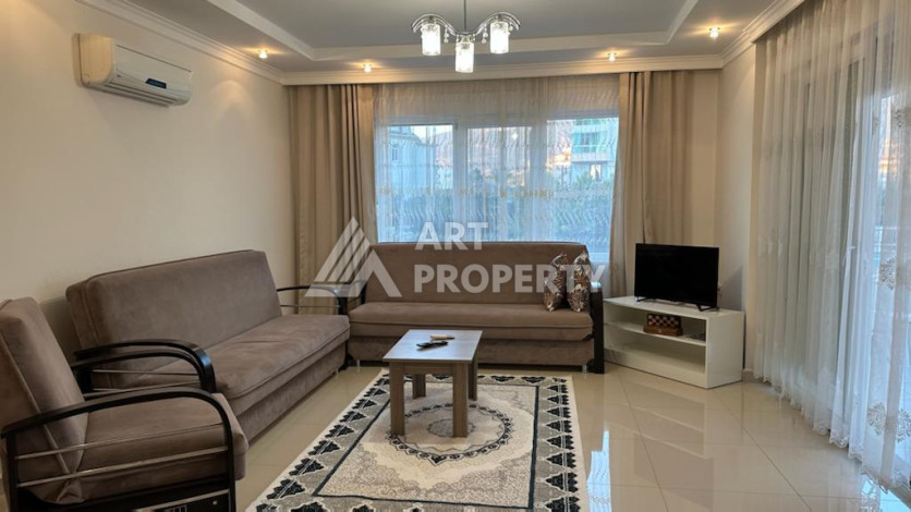 Меблированная квартира вблизи моря планировки 1+1 в районе Кестель, 70м2 - Ракурс 10