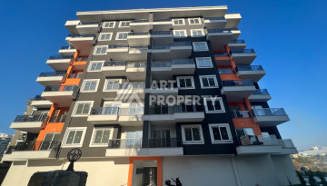 Апартаменты в живописном районе Авсаллар в новом жилом комплексе. Планировка 1+1, 63м2 - Ракурс 3
