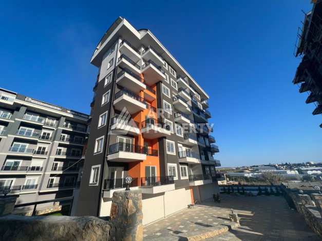 Апартаменты в живописном районе Авсаллар в новом жилом комплексе. Планировка 1+1, 63м2 - Ракурс 3