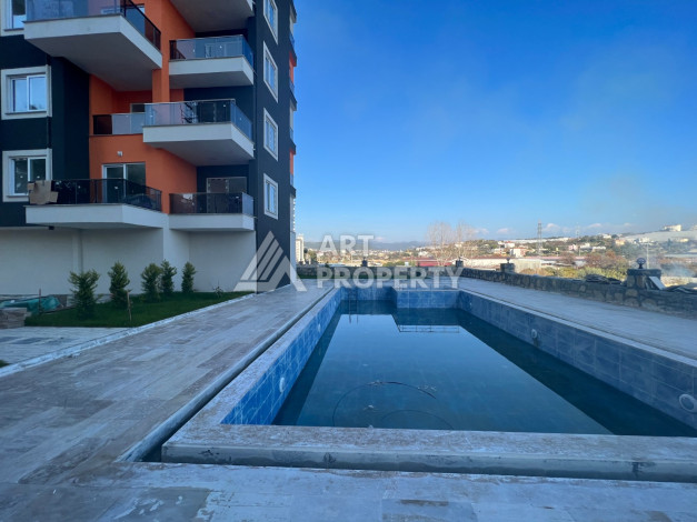 Апартаменты в живописном районе Авсаллар в новом жилом комплексе. Планировка 1+1, 63м2 - Ракурс 4