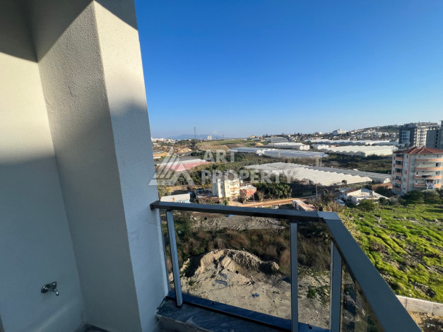 Апартаменты в живописном районе Авсаллар в новом жилом комплексе. Планировка 1+1, 63м2 - Ракурс 18