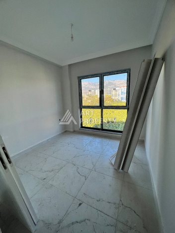 Две квартиры 1+1 от инвестора по цене дешевле, чем у застройщика, район Махмутлар! - Ракурс 6